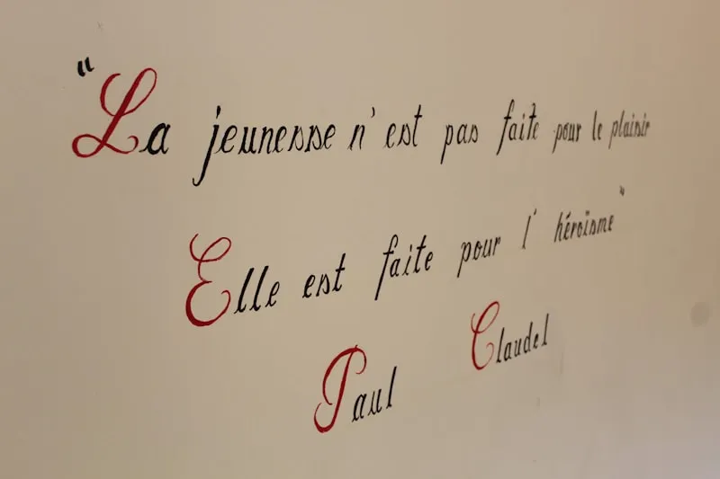 a close up of a writing on a wall